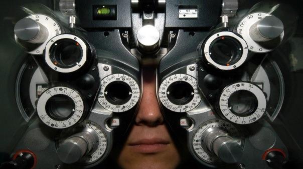 Person getting eyes checked.